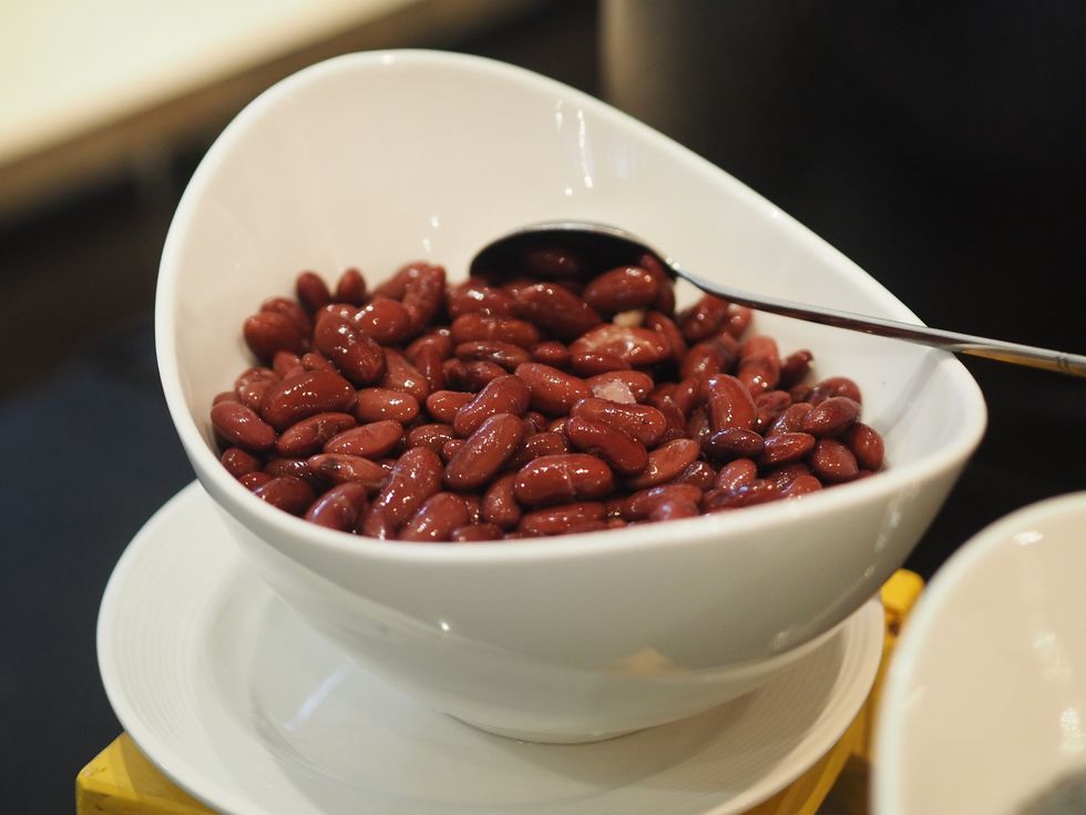 boiled red beans in white bowl
