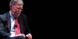 former national security adviser john bolton r speaks on stage during a public discussion at duke university in durham, north carolina on february 17, 2020   bolton was invited to the school to discuss national security weeks after he was thought of as a key witness in the impeachment trial of president donald trump photo by logan cyrus  afp photo by logan cyrusafp via getty images