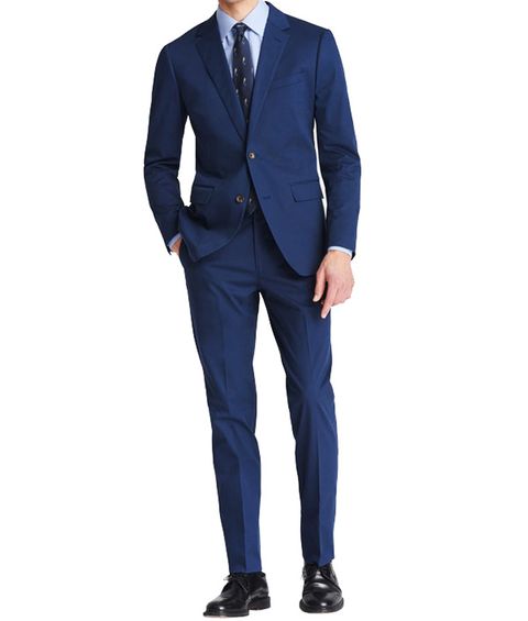 Suit, Clothing, Formal wear, Outerwear, Blazer, Standing, Cobalt blue, Tuxedo, Electric blue, Suit trousers, 