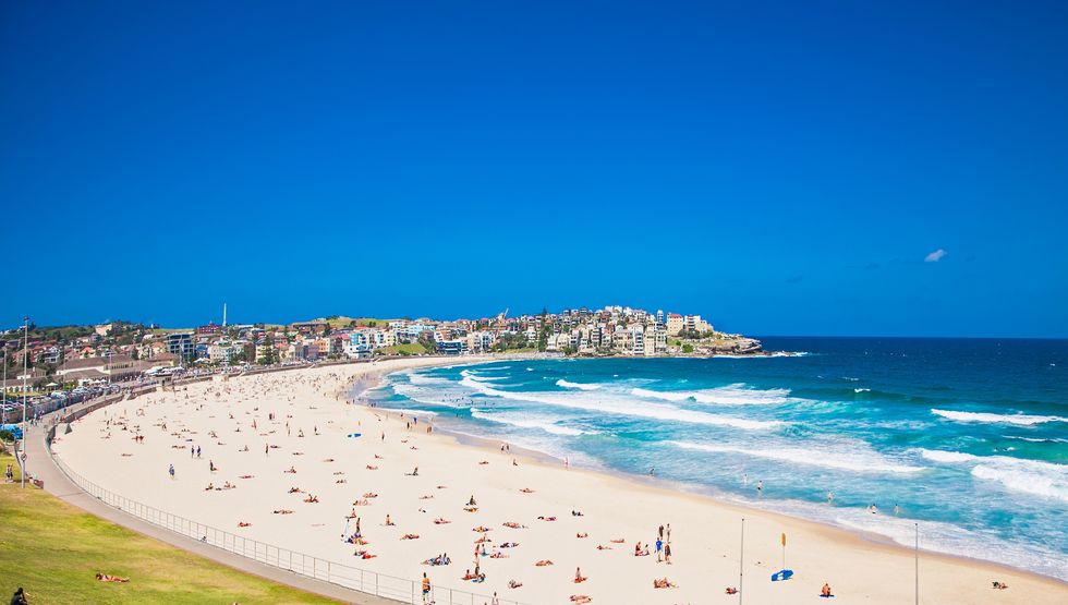 people relaxing on bondi beach in sydney, australia bondi beach is one of the most famous beaches in the world.