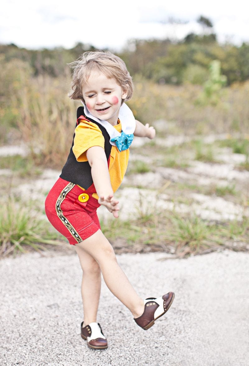 little girl dressed in homemade pinocchio costume