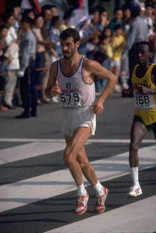 2 oct 1988 gelindo bordin 579 of italy leads juma ikangaa 168 of tanzania during the marathon event at the 1988 olympic games in seoul, south korea \ mandatory credit mike powellallsport