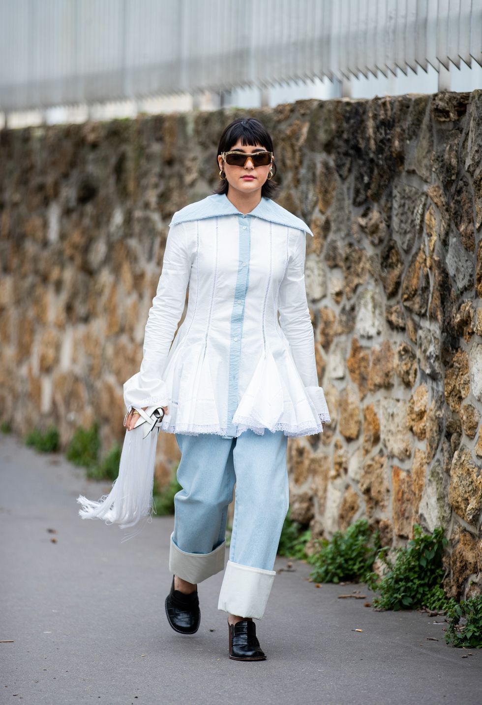 paris, france   february 28 maria bernad is seen wearing white jacket, bag with fringes, turquoise pants outside loewe during paris fashion week   womenswear fallwinter 20202021  day five on february 28, 2020 in paris, france photo by christian vieriggetty images