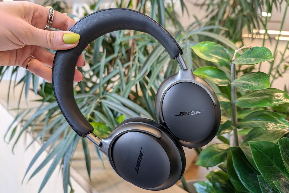 bose quietcomfort ultra headphones in front of plants