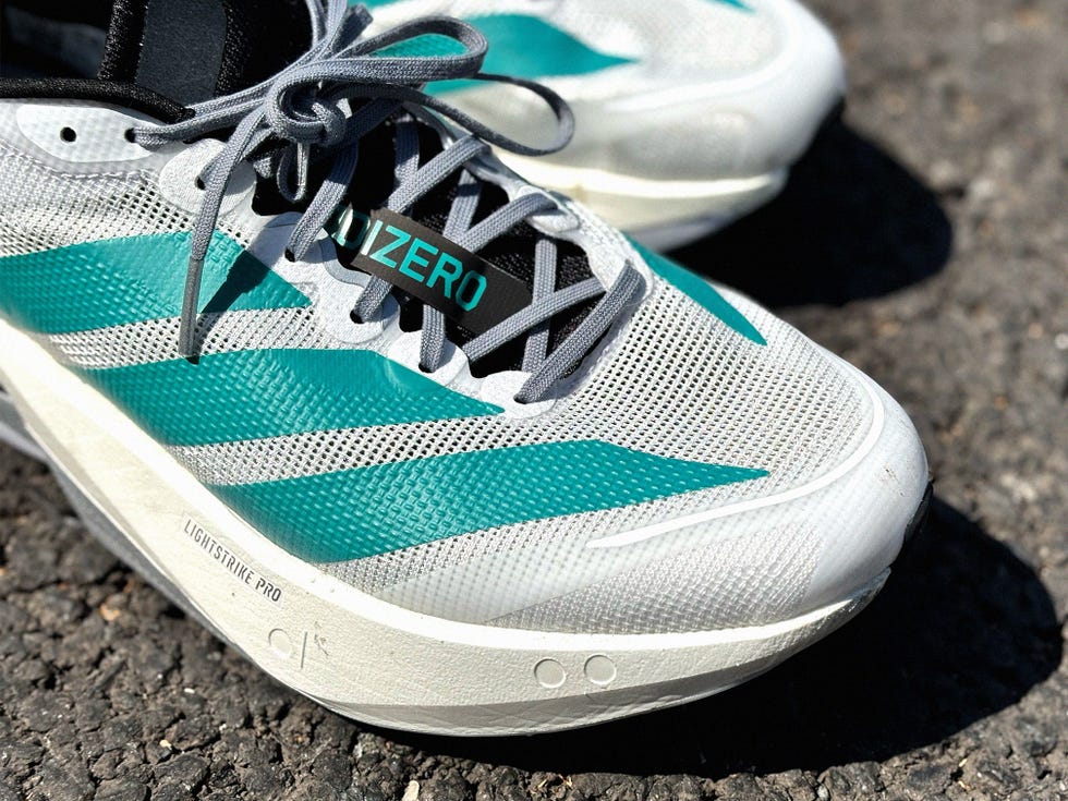close up of a white Adidas exclusive running shoe
