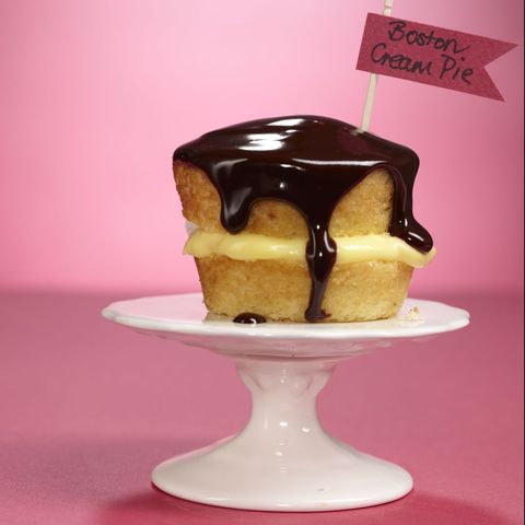boston cream cupcake on a cake stand