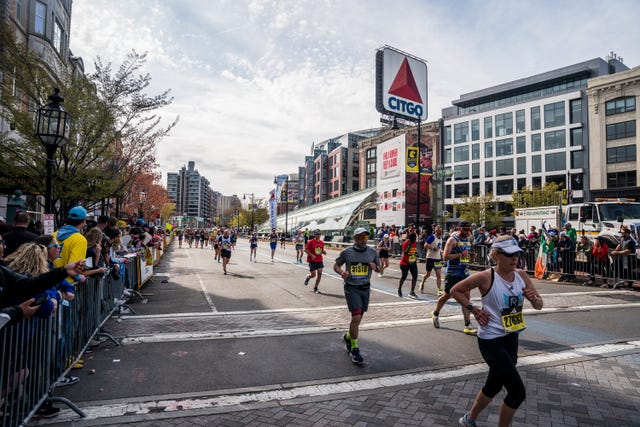 a group of runners in a marathon