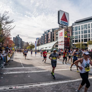 a group of runners in a marathon a group of runners in a marathon