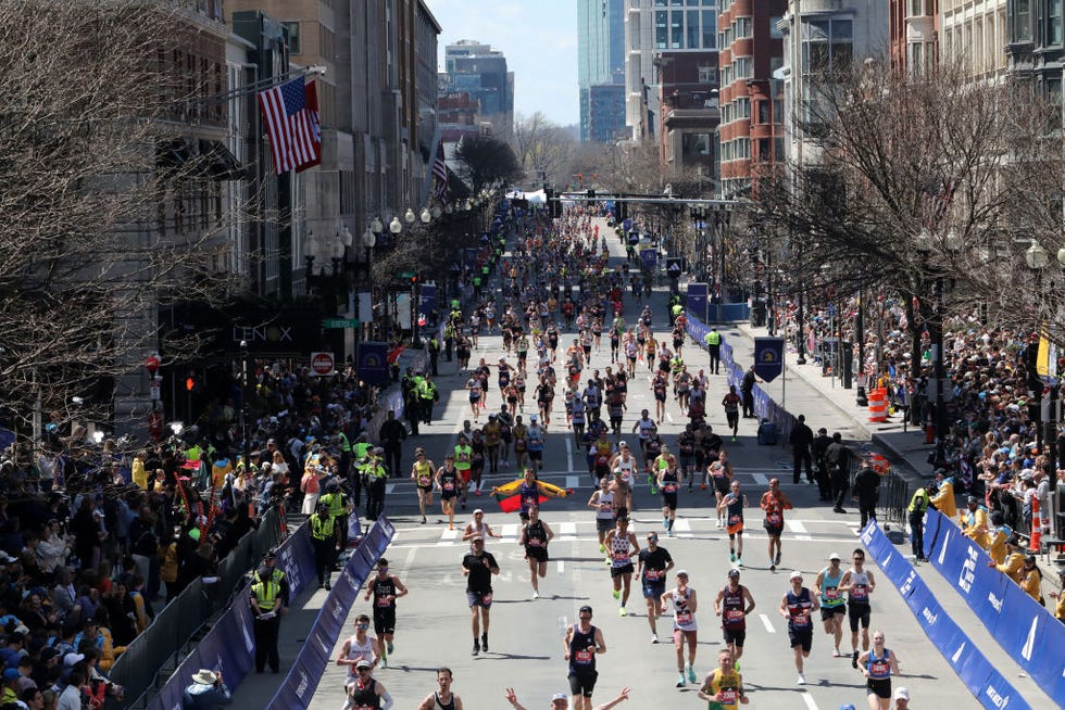 boston, united states april 15 people reach the finish line at the boston marathon in boston, massachusetts, on april 15, 2024 photo by lauren owens lambertanadolu via getty images