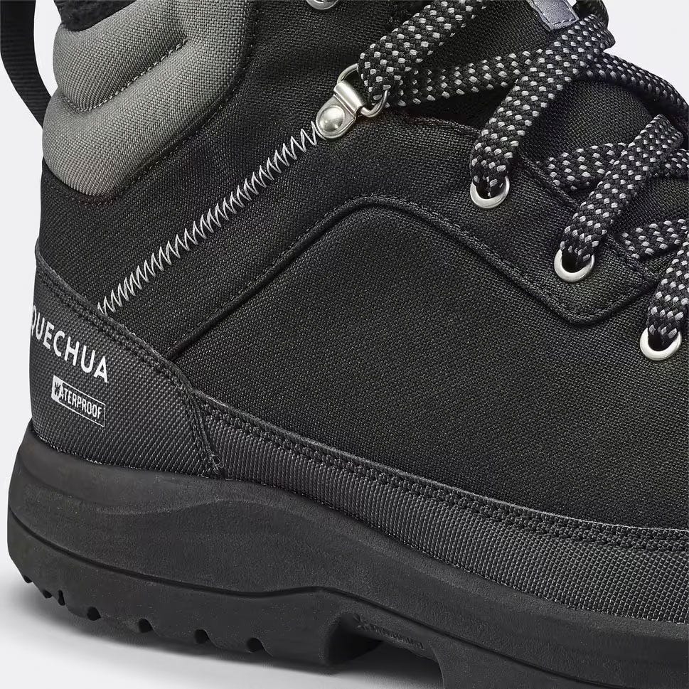 waterproof black hiking boot highlighting design and branding