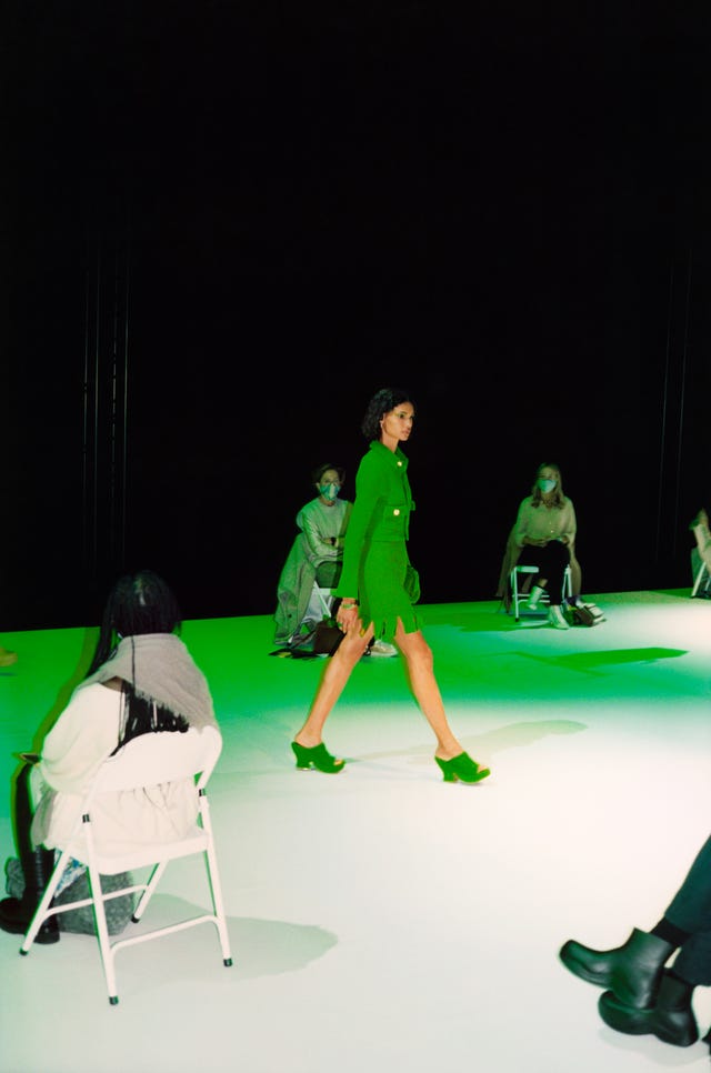 Green, Coat, Dress, Drama, Fashion, Knee, heater, Stage, Costume design, Scene, 