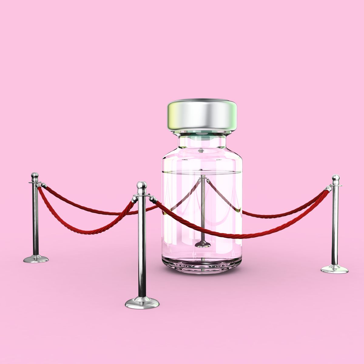 a bottle containing medical liquid stands alone inside a red roped area on a pale pink backdrop, low angle view