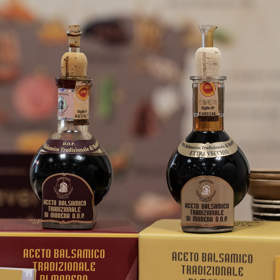 bottles of modena balsamic vinegar on display during...