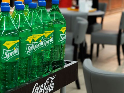 bottles of sprite soft drink by coca cola company are seen