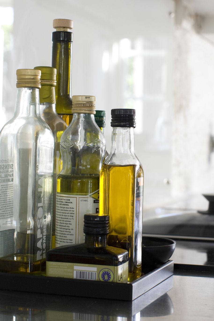 bottles on kitchen worktop, close up