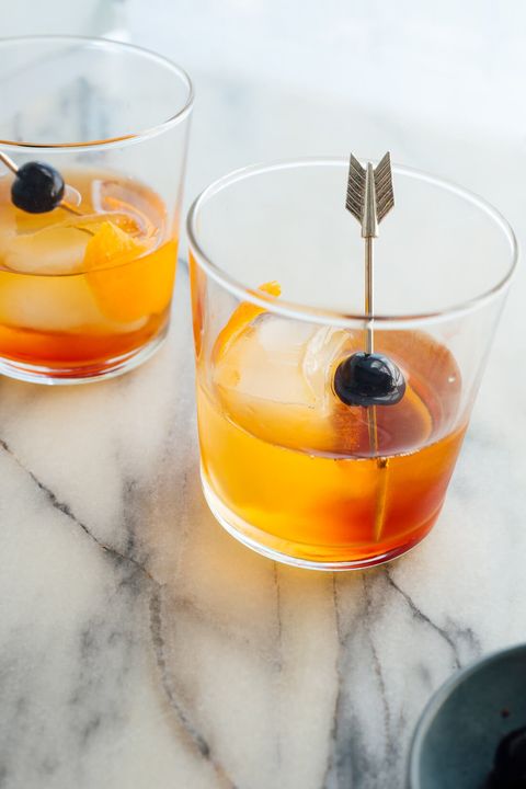 new old fashioned with cherry on pick
