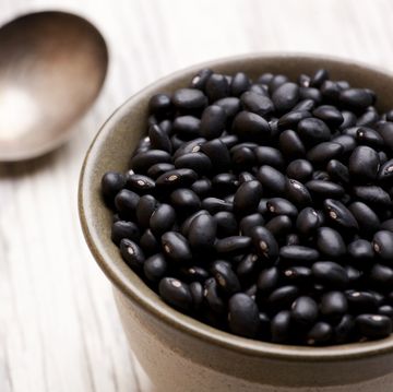 bowl filled with a large amount of black beans