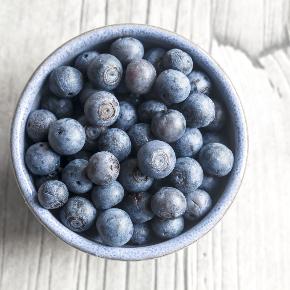 bowl of blueberries on wood