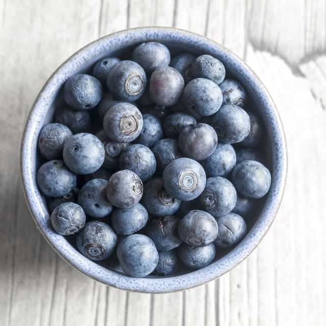 bowl of blueberries on wood