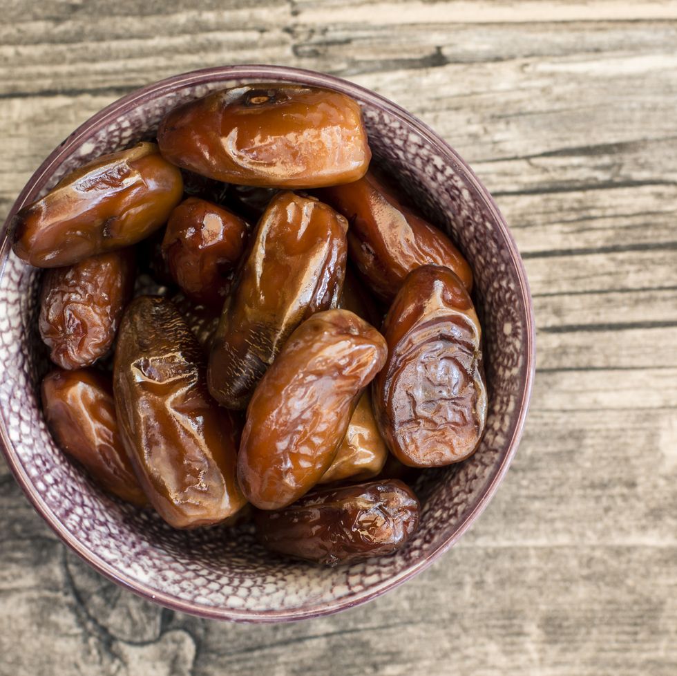 bowl of dates on wood