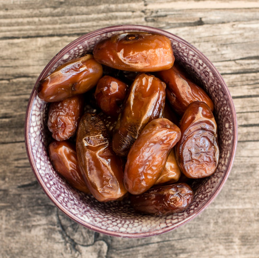 bowl of dates on wood