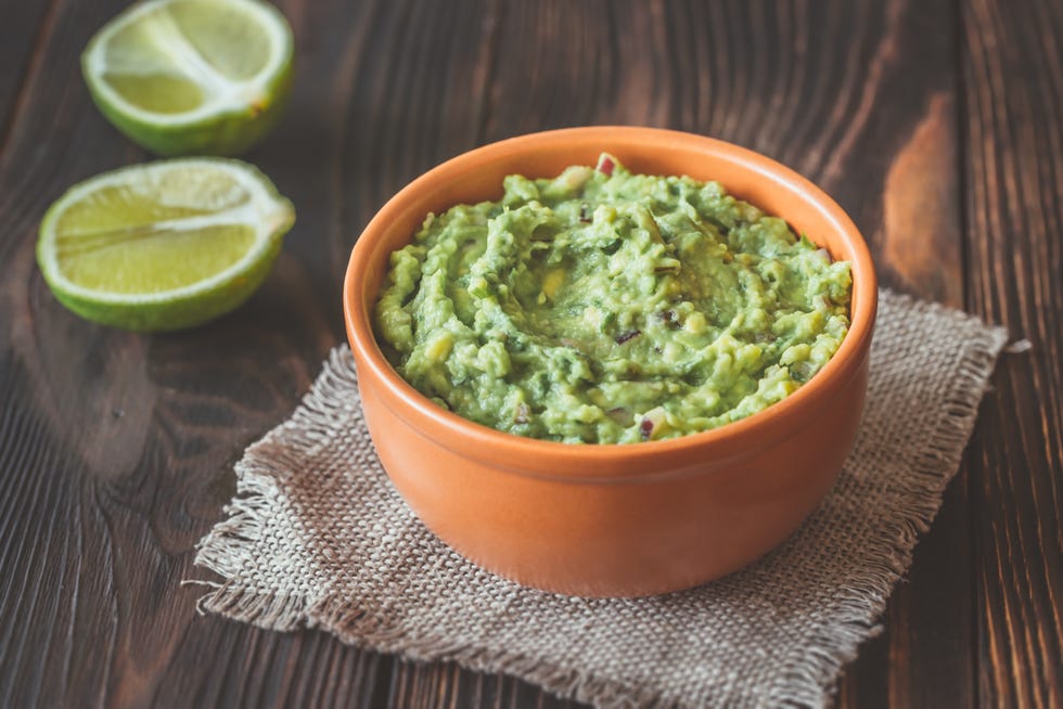 bowl of guacamole on the wooden table,romania
