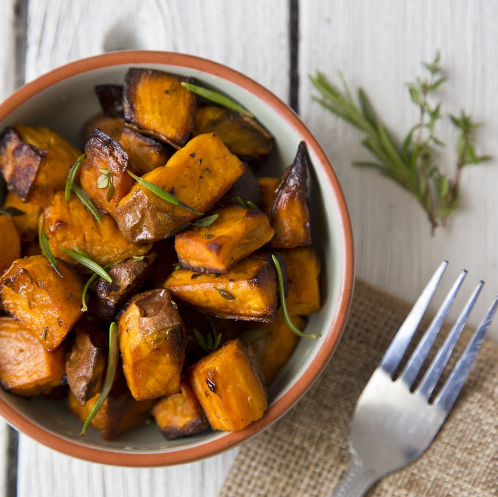 bowl of oven roasted sweet potato with rosemary and thyme