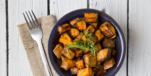 Bowl of oven roasted Sweet Potato with rosemary and thyme