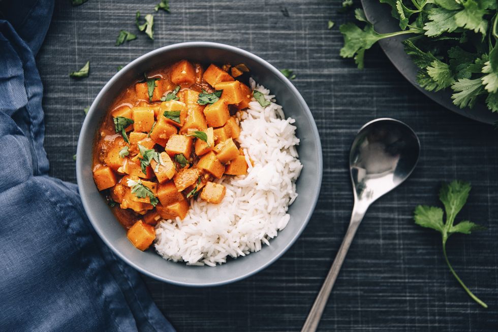 bowl of sweetpotato ragout served with rice