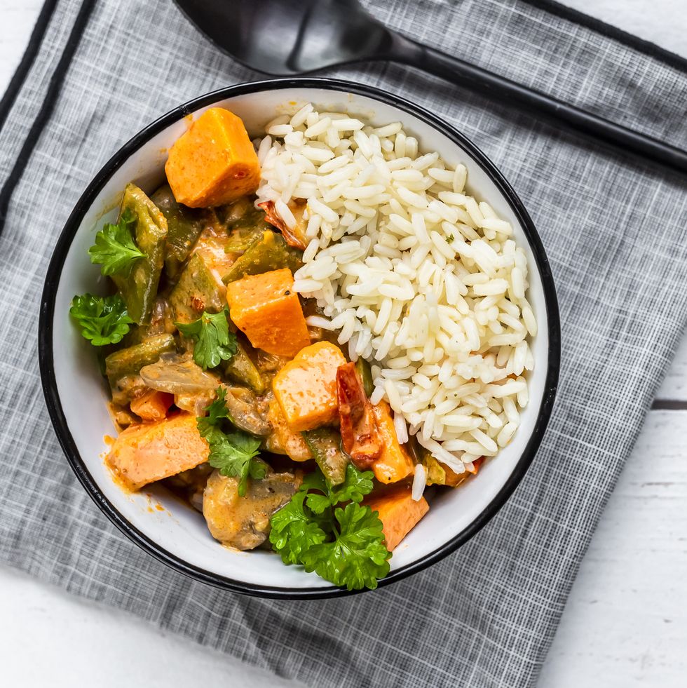 bowl of vegan sweet potatoe curry with rice