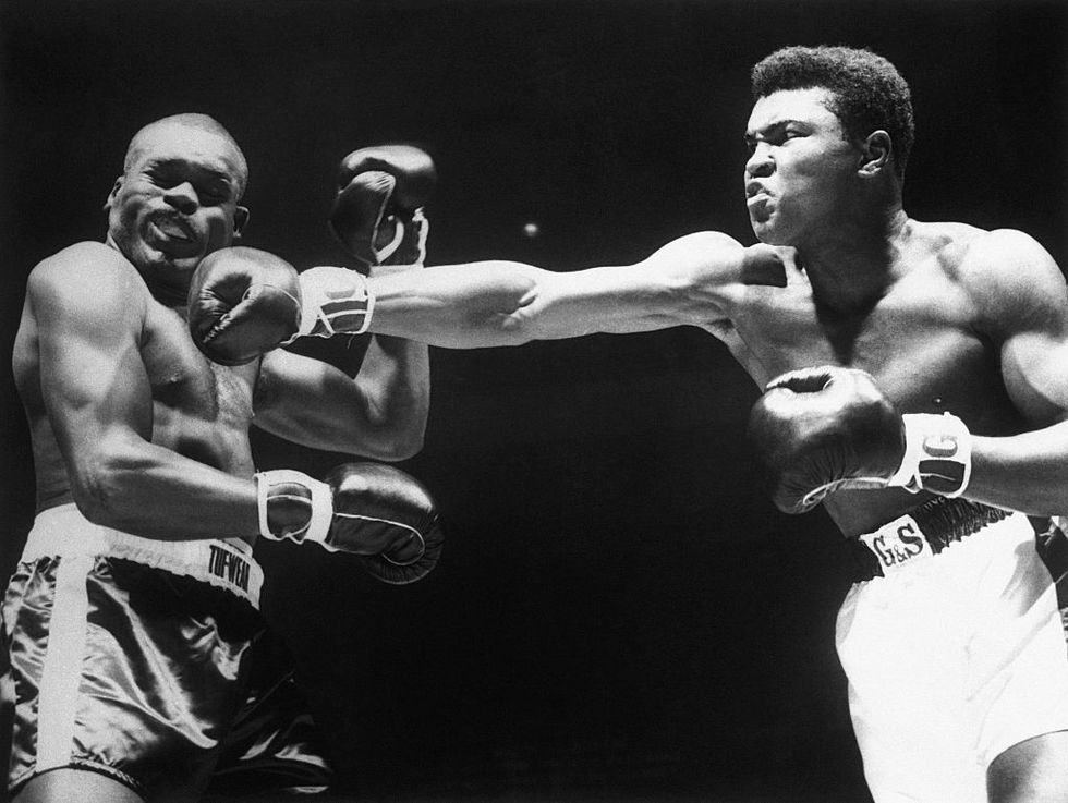 cassius clay punches doug jones with his right glove
