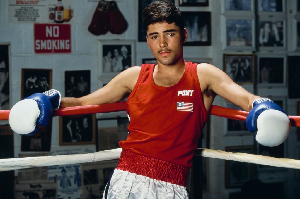 Young female boxer in ring, gloves raised, portrait | Female boxers, Boxing  girl, Women boxing