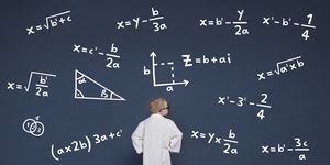 boy with mathematical equations