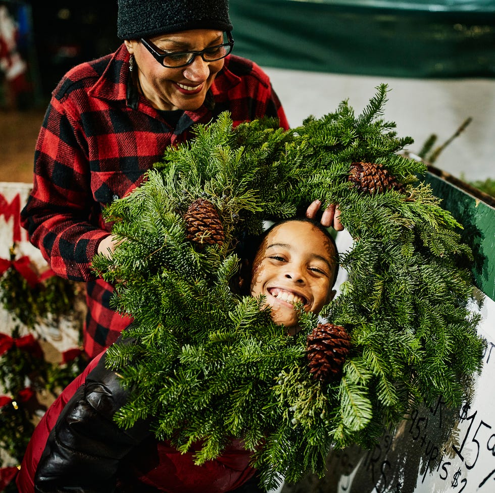 boy playing with wreath christmas lyric quiz