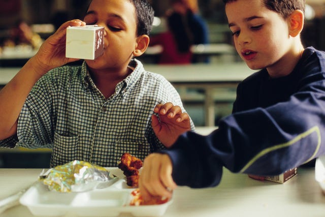 Boys Eating Lunch in Cafeteria