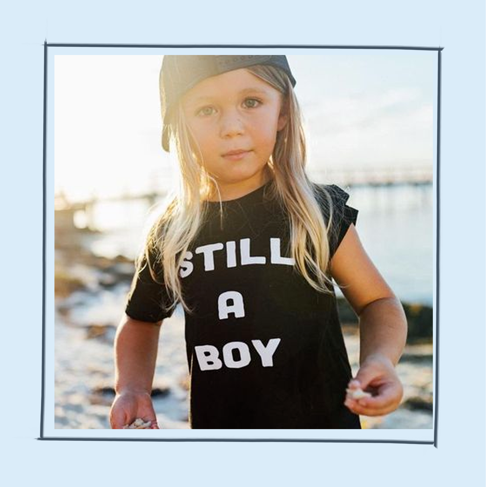 T-shirt, Clothing, Product, Photography, Blond, Top, Sleeve, Child model, Picture frame, Smile, 