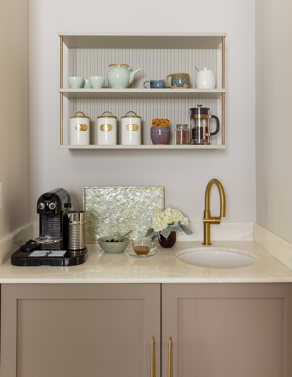small kitchen sink area in bedroom