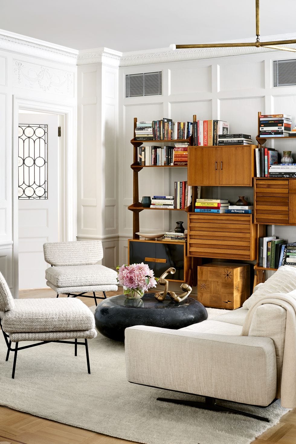 Living room, Furniture, Room, Shelf, Interior design, Shelving, Couch, Table, Coffee table, Floor, 