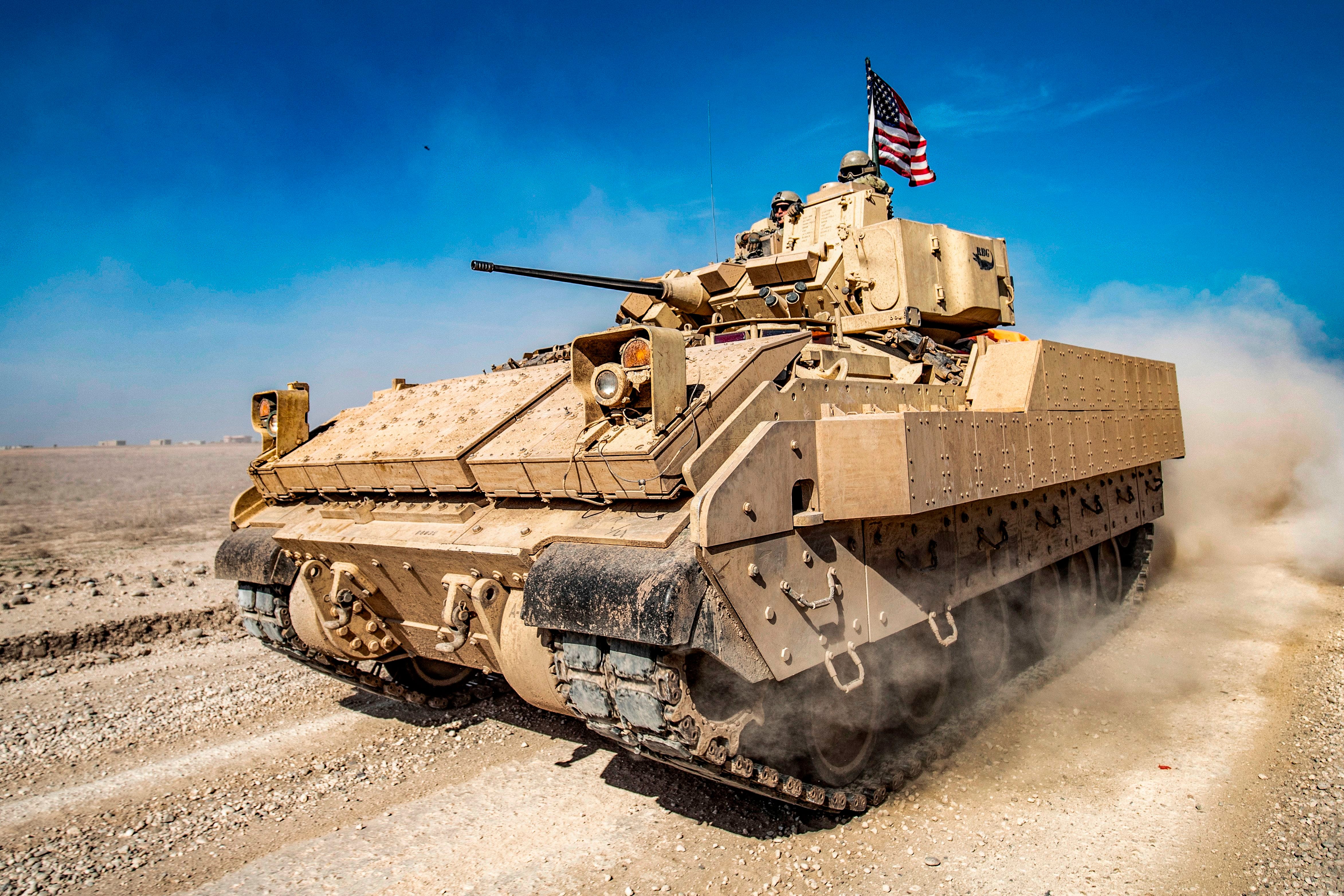 bradley-fighting-vehicle-patrols-in-the-suwaydiyah-oil-news-photo-1673022021.jpg