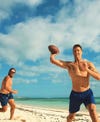 Tom Brady Looks Shredded in Shirtless Beach Football Photos