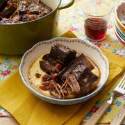 braised ribs braised ribs in bowl over polenta yellow linen