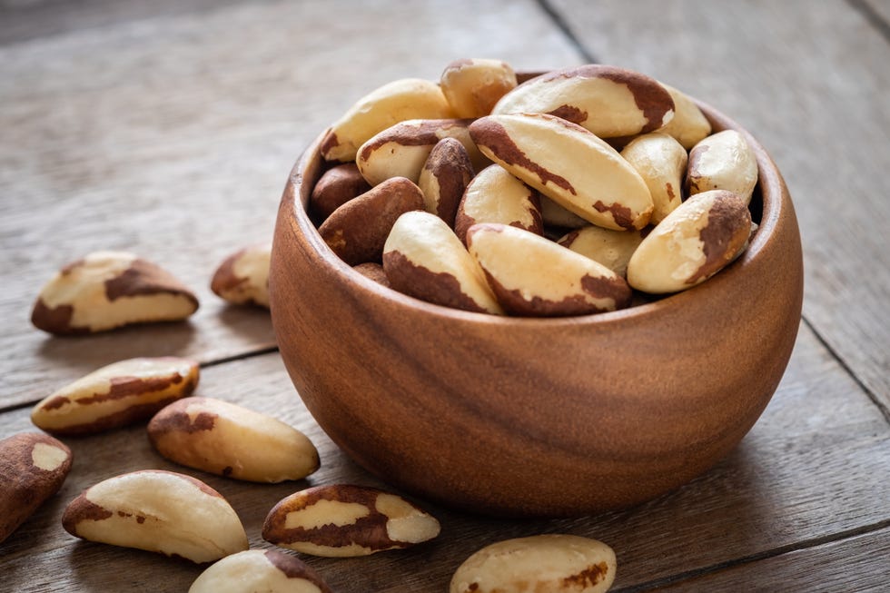 brazil nuts in wooden bowl