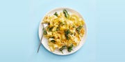 a plate of pasta with greens and breadcrumbs