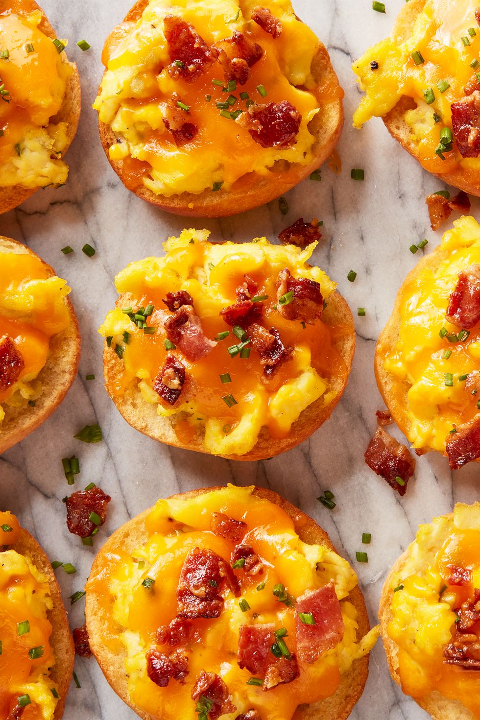 breakfast bagel bites topped with cheese and bacon