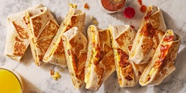 crunchwrap layered with eggs, hashbrowns, and bacon