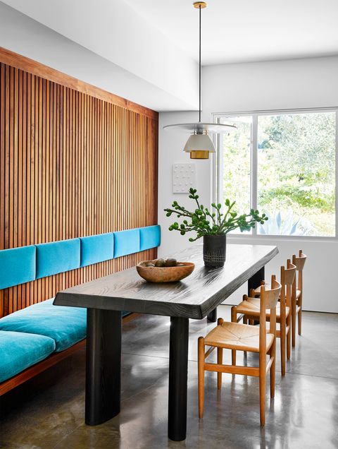 breakfast nook with blue back cushions