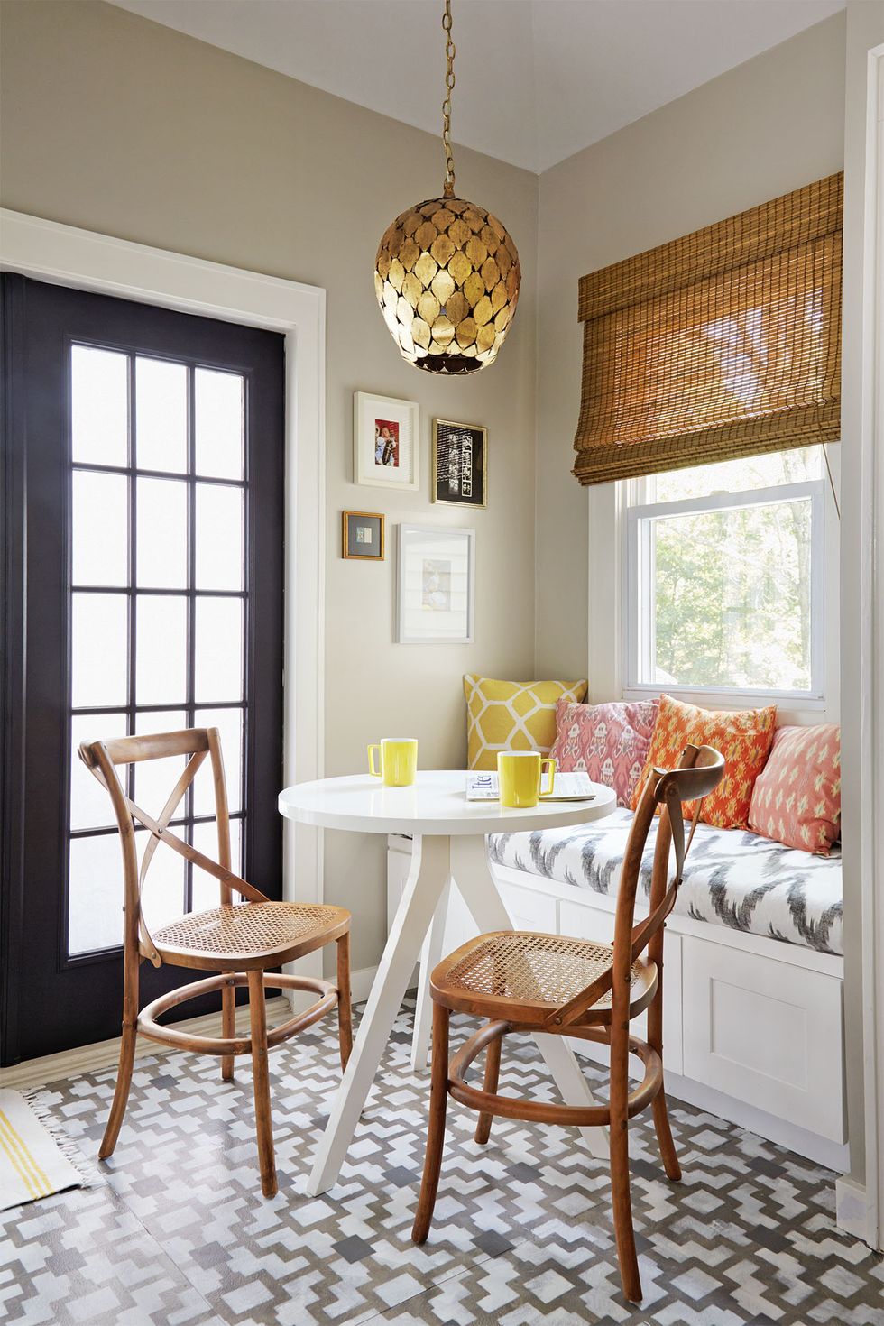 breakfast nook ideas, patterned bench with wicker chairs