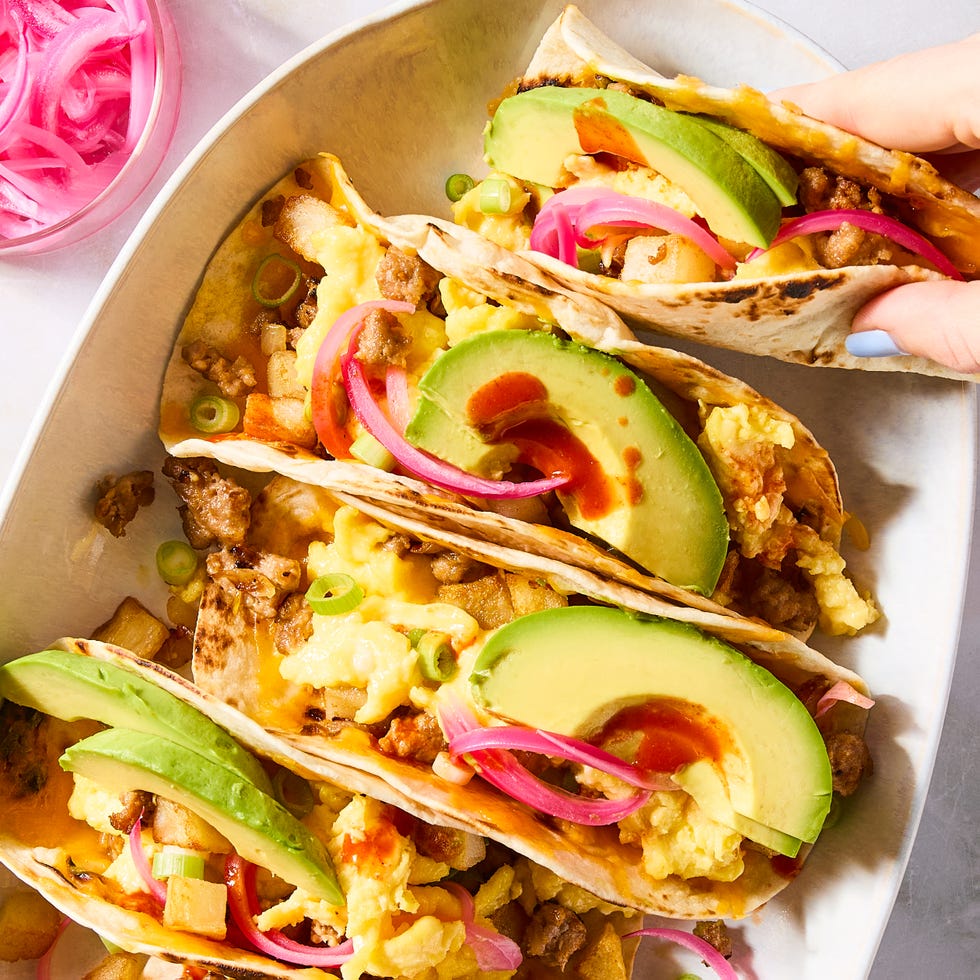 breakfast tacos topped with avocado