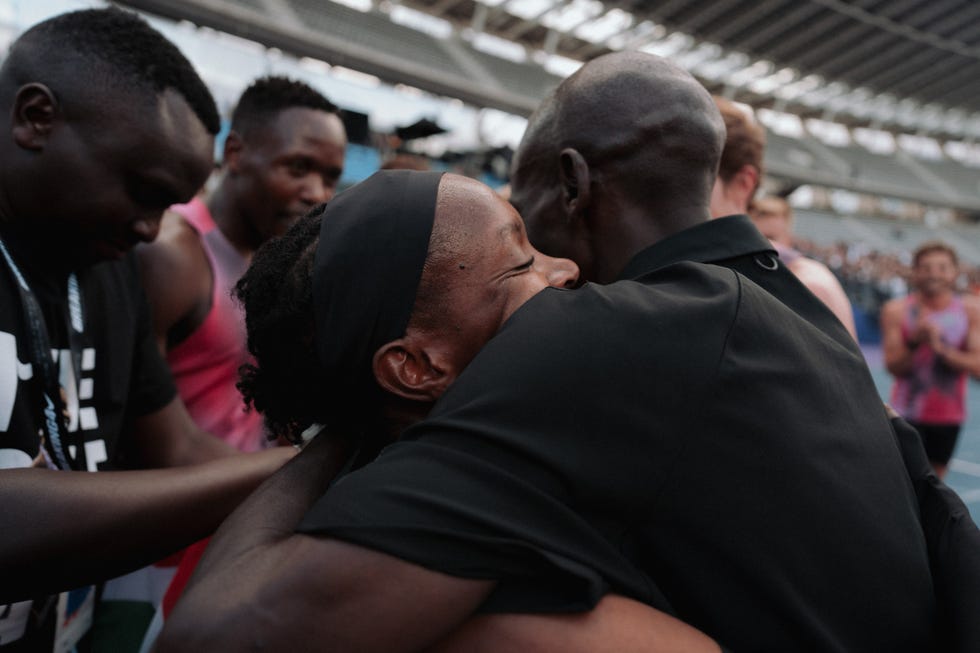faith kipyegon and eliud kipchoge embrace after the breaking4 attempt in paris