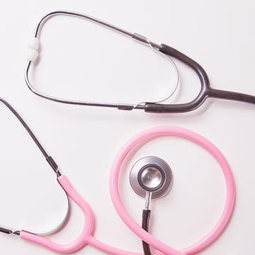 top view of two stethoscopes isolated on white top view of two stethoscopes isolated on white
